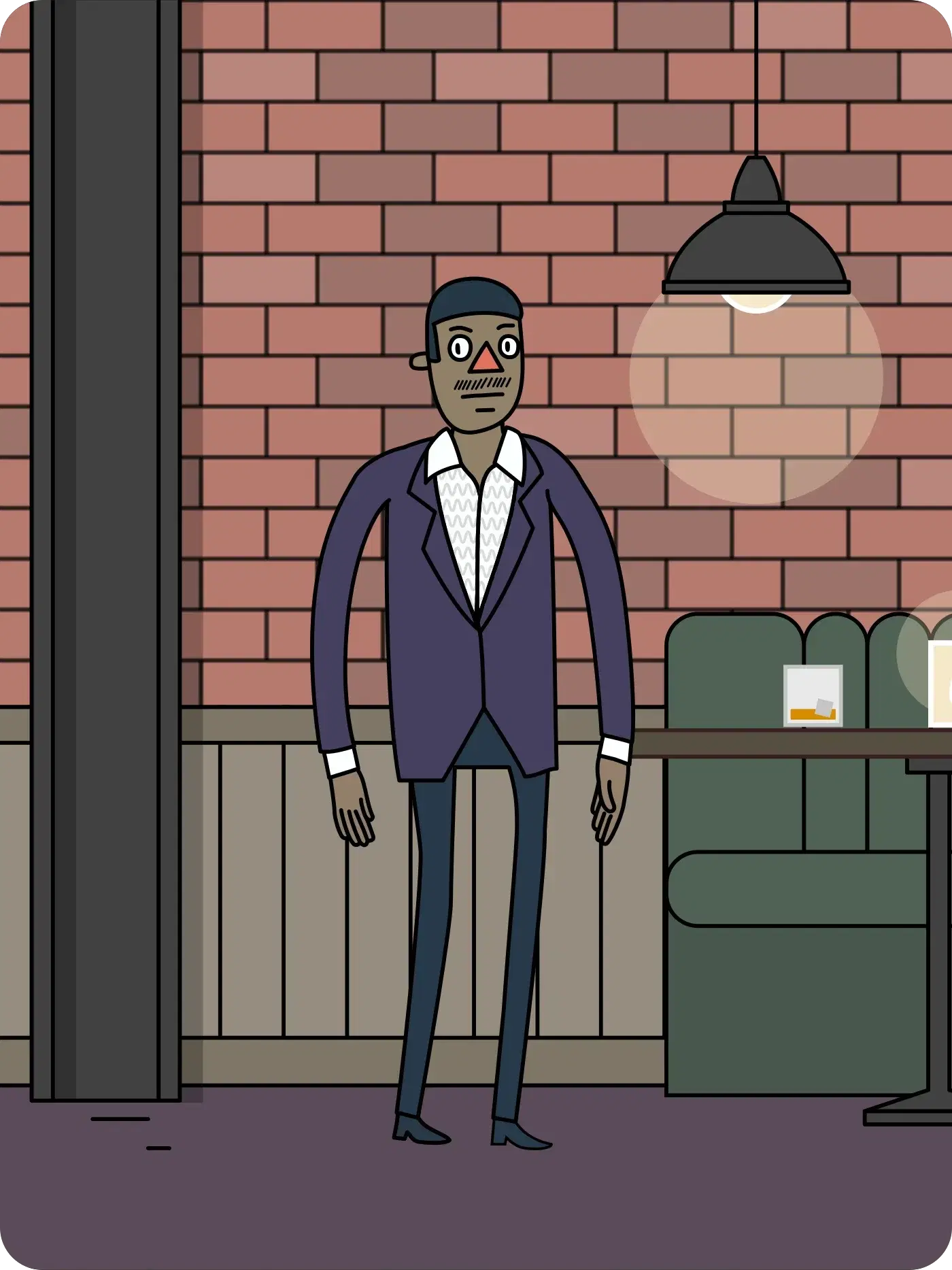 Coltrane in a brick-walled room with a low green couch